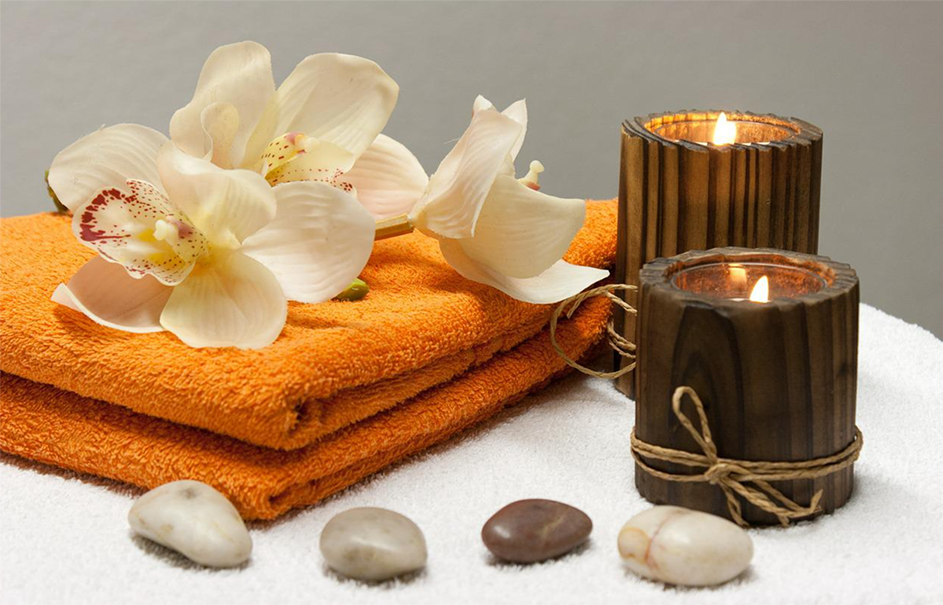 Orange towel and candles picture